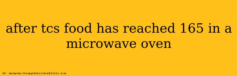 after tcs food has reached 165 in a microwave oven